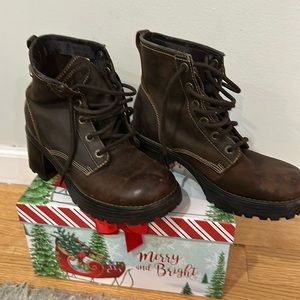 Pair of Skechers high heel boots two inch heels